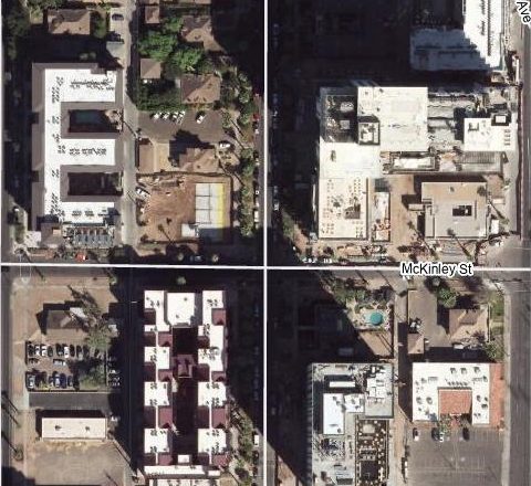 Aerial view of the same corner in fall 2024, with foundations for Residences on 2nd
