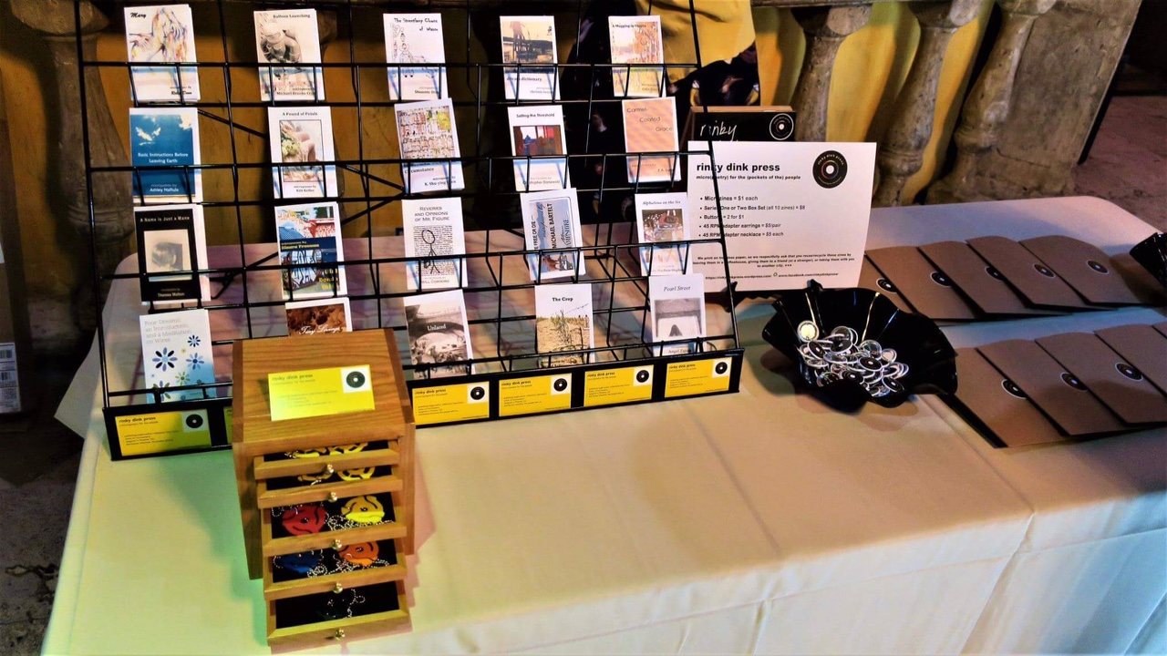 rinky dink press microzines on a display rack