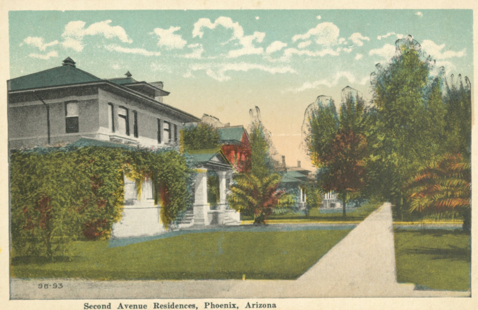 Hand-colored postcard titled Second Avenue Residences, Phoenix, Arizona, showing a two-story house covered in vines, front lawns, palms and a sidewalk